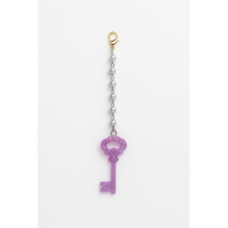 Accessoire décoratif clé violette avec perles