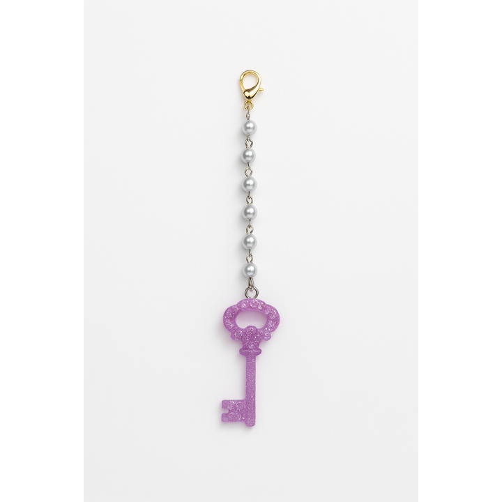 Accessoire décoratif clé violette avec perles
